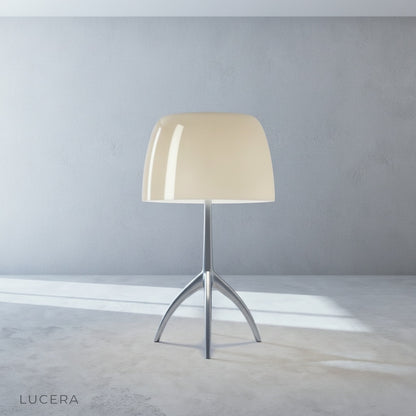 Albescent Table Lamp in olive green finish on a sideboard in a bohemian styled dining room