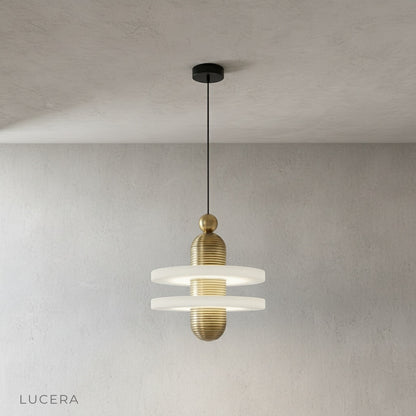overhead view of Marianist pendant light casting warm ambient shadows