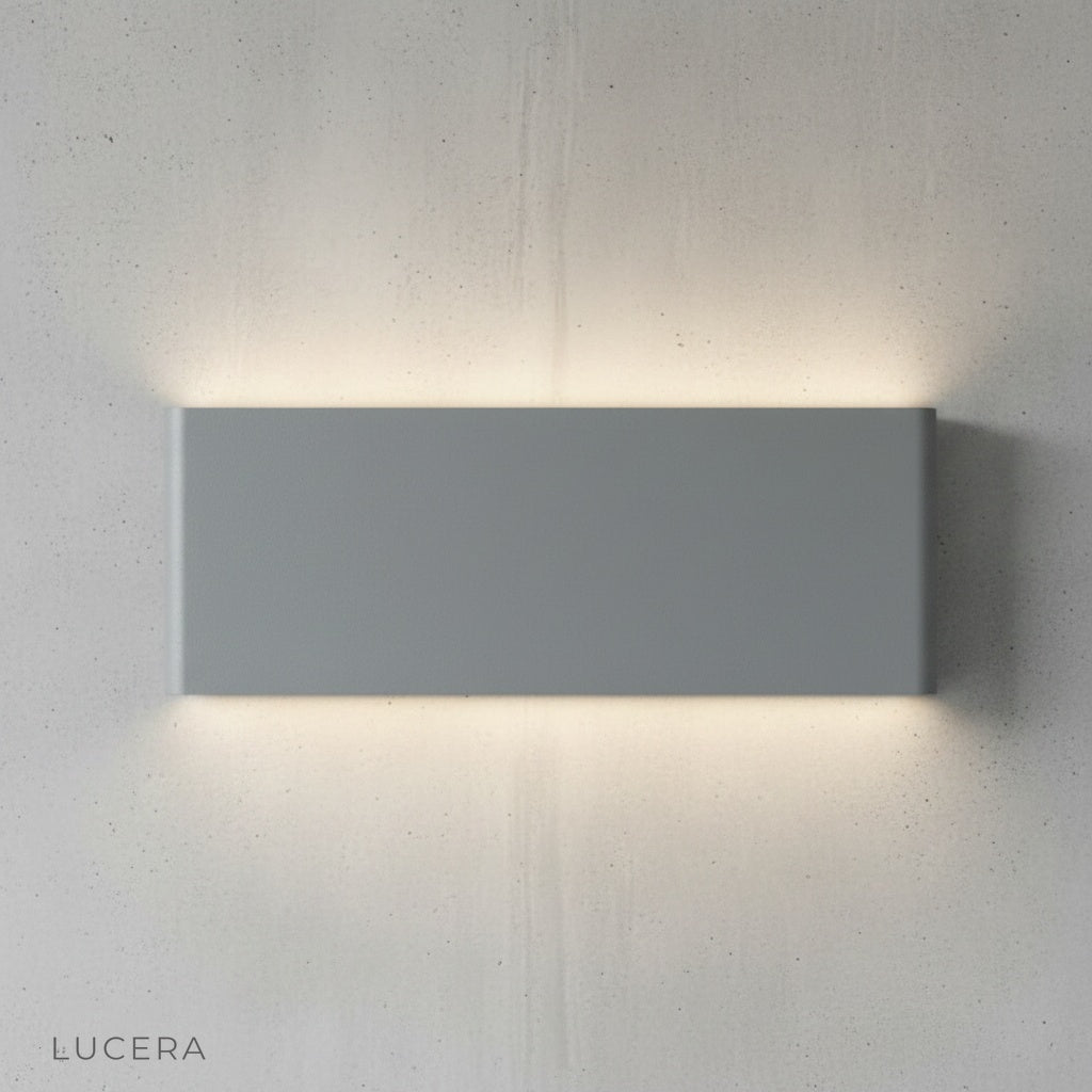 overhead view of Cadmium wall lamp showing slim profile and mounting plate