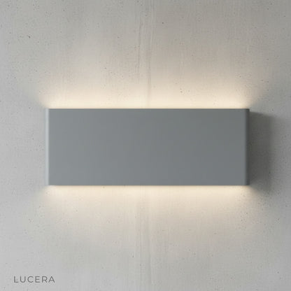 overhead view of Cadmium wall lamp showing slim profile and mounting plate