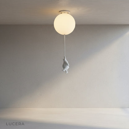 Lintel ceiling light with balloon-shaped shade in cozy reading corner