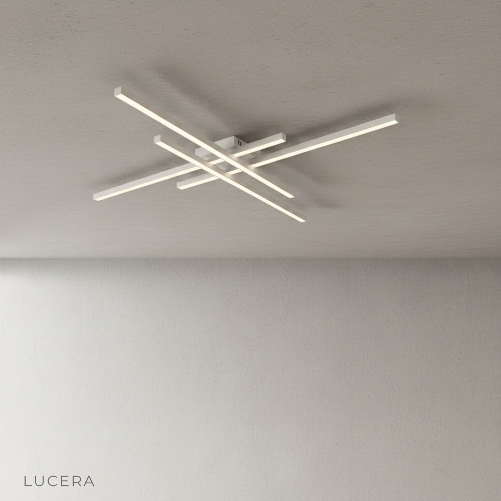 Upland ceiling light mounted on low ceiling in cozy bedroom with soft ambient glow
