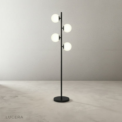Evening shot of the floor lamp illuminating a dark hallway with marble base visible