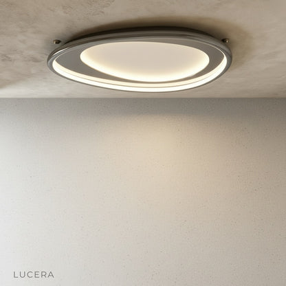 Tantalus ceiling light in hallway with frosted acrylic glowing softly