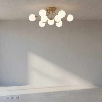 Crypt ceiling light glowing at dusk in a stylish entryway with neutral walls