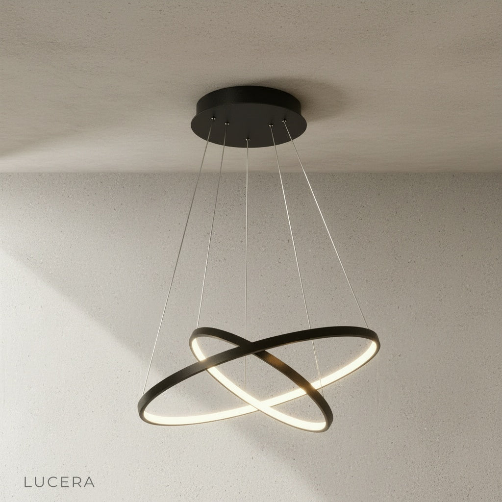 large wash chandelier hanging above modern wooden dining table in loft