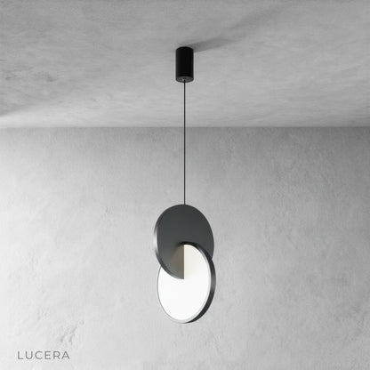 bedroom bedside pendant light with warm light casting geometric shadows on textured wall