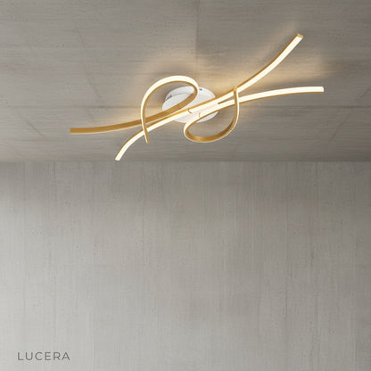 artistic ceiling lamp with intertwined bars in dark moody room at night