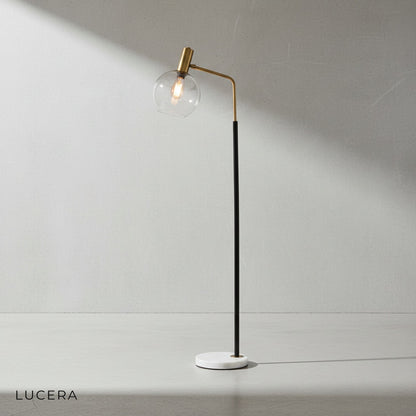 Geneva floor lamp in minimalist bedroom with neutral decor