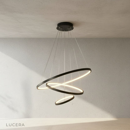 small wash chandelier in cozy bedroom with soft warm white glow