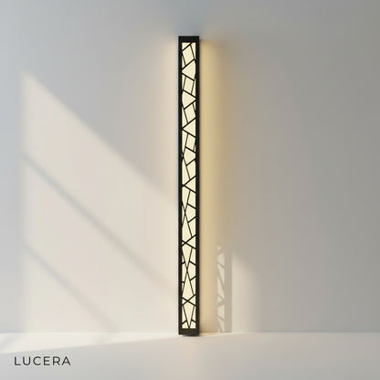 Giselle Outdoor Lamp in cool daylight mode on minimalist stucco wall