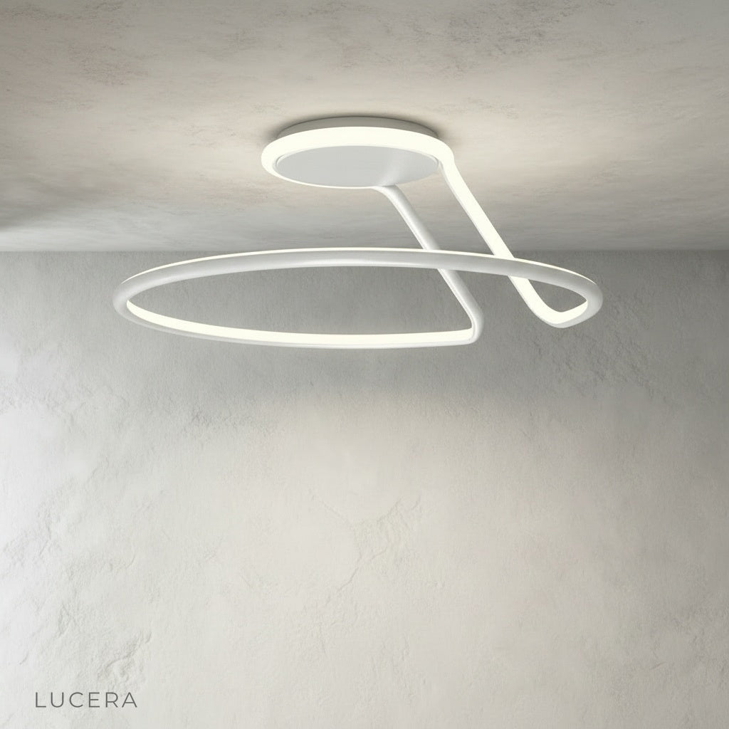 Loom ceiling light in contemporary dining room with wooden table