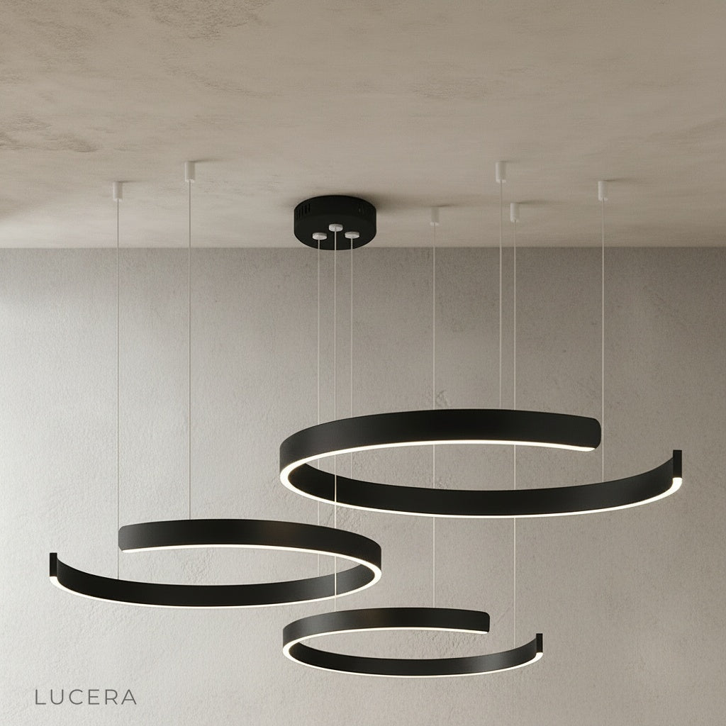 nighttime lifestyle shot of ring chandelier casting warm light in bedroom