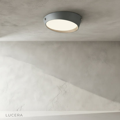alabaster ceiling light in open-concept kitchen island setting with soft daylight