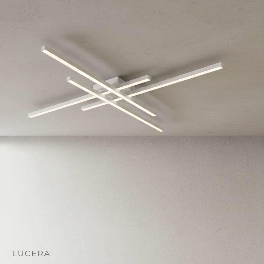 overhead view of Upland ceiling light against dark ceiling showing geometric aluminum design