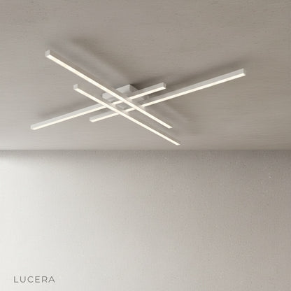 overhead view of Upland ceiling light against dark ceiling showing geometric aluminum design