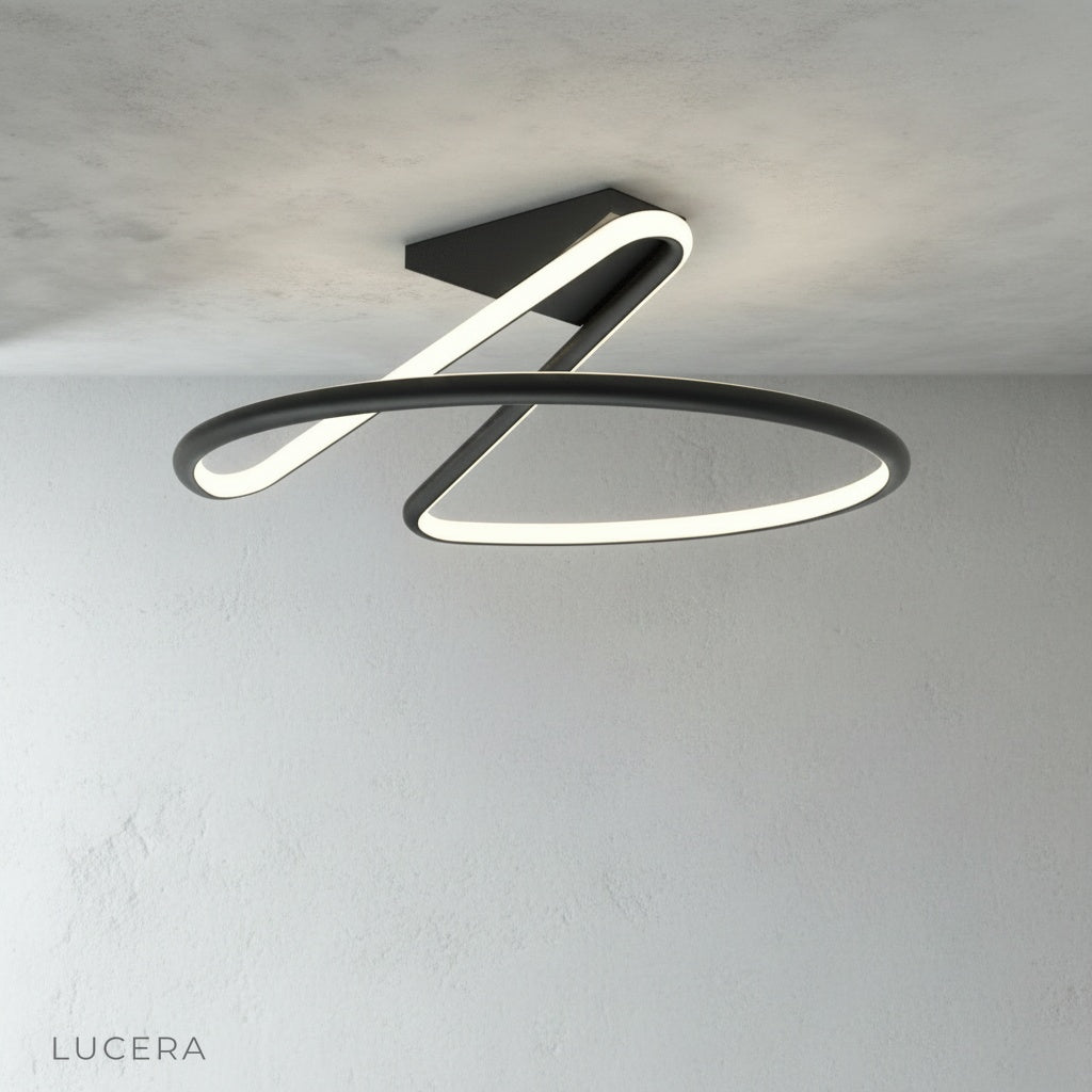 Loom ceiling light glowing at dusk in stylish living space