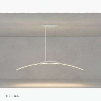 Edda chandelier with warm glow in a dimly lit evening living room scene