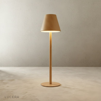 yellow table lamp on entryway shelf with keys and small plant, inviting glow