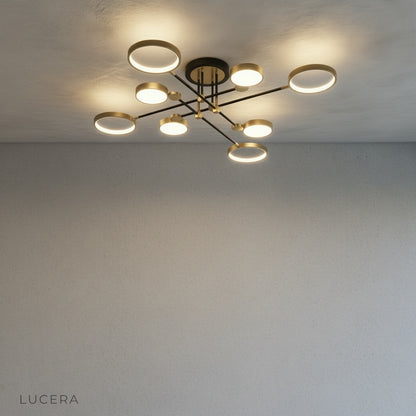 Nighttime lifestyle shot of yin-yang ceiling light glowing softly in minimalist living space