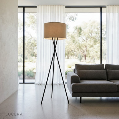 Venus Floor Lamp illuminating a modern living room with warm ambient light