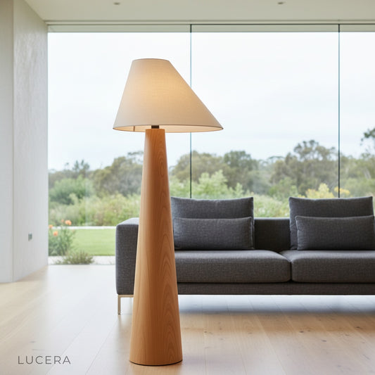 Lucera garden floor lamp with wood base and fabric shade in cozy living room