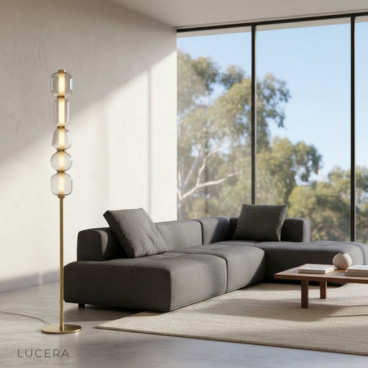 Morpheus Floor Lamp glowing in modern living room with stacked glass orbs and gold metal base