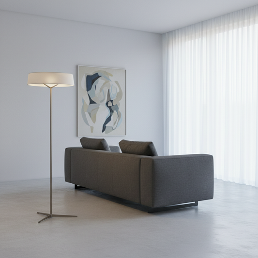 Glacier Floor Lamp glowing beside a modern sofa in a bright contemporary living room
