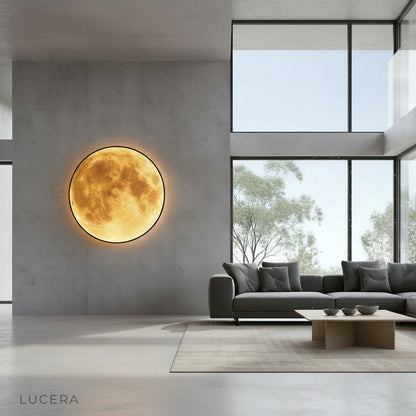 Caspian Moon Wall Lamp illuminated art glowing in a modern living room with warm ambient lighting