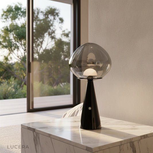 Harlan Table Lamp glowing in modern living room on side table