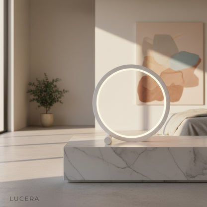 Amarone Touch Table Lamp glowing on modern bedside table in cozy bedroom