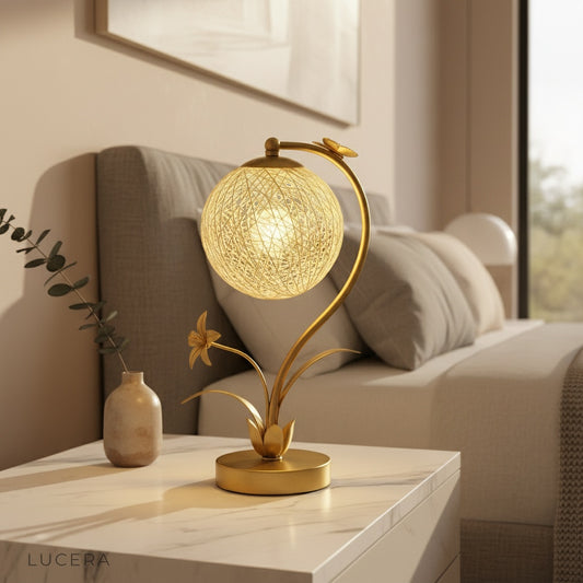 Domenica Table Lamp with faux flowers and butterfly on modern sideboard in cozy living room
