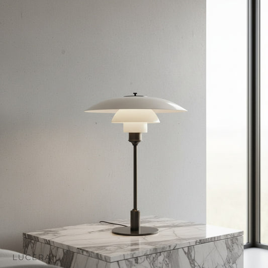 green glass baccarat table lamp on wooden bedside table in cozy bedroom