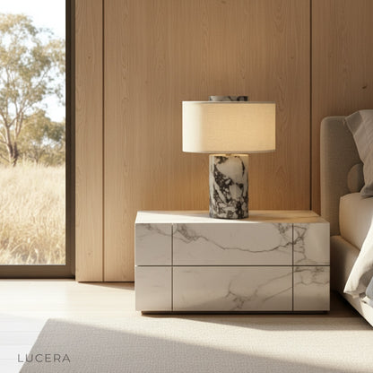 colva table lamp with natural stone base and fabric shade on wooden bedside table