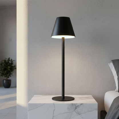 yellow table lamp glowing on bedside table in cozy bedroom with warm ambient light