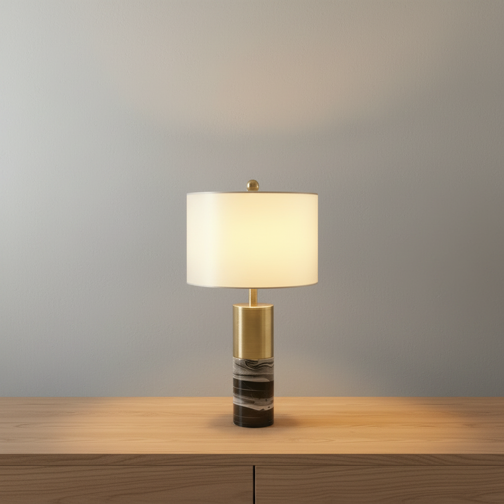Essere Table Lamp glowing on marble side table in modern living room with soft ambient light