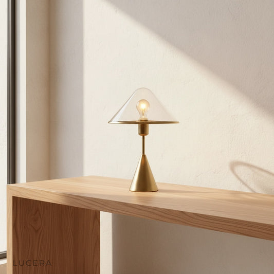 Manganese blue table lamp glowing on wooden sideboard in modern living room