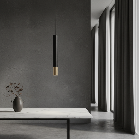 Fascinate pendant light with gold band over a modern kitchen island in a bright living space