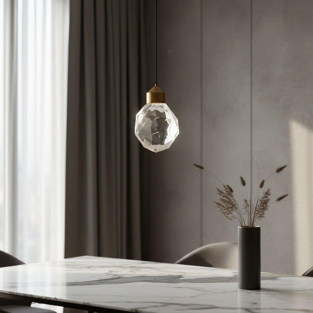 crystal pendant light glowing above modern dining table in elegant living room