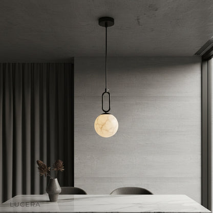 Haven alabaster pendant light glowing in modern living room