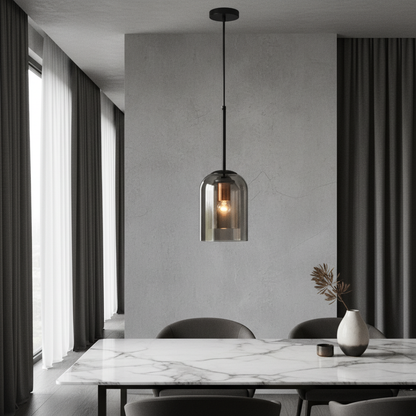 Theodora double glass pendant light with brass accents illuminating a modern dining room