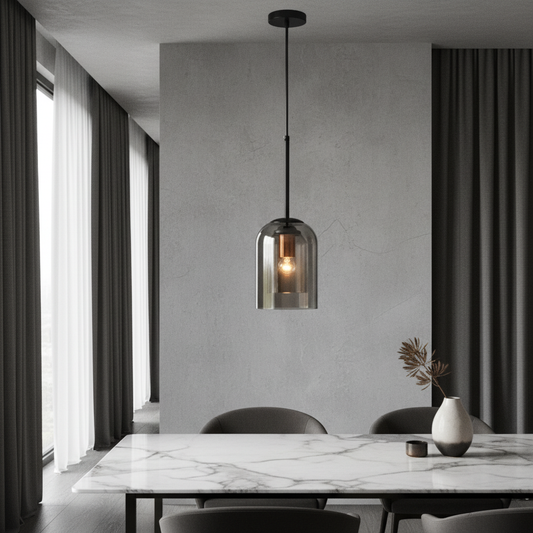 Theodora double glass pendant light with brass accents illuminating a modern dining room