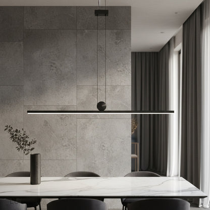 Eleonora pendant light glowing over modern living room dining table with minimalist decor