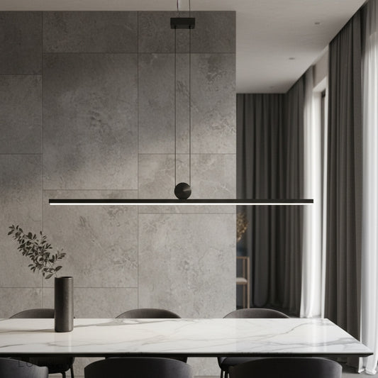 Eleonora pendant light glowing over modern living room dining table with minimalist decor
