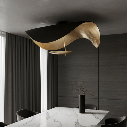 Xenial ceiling lamp glowing in modern living room with organic curves