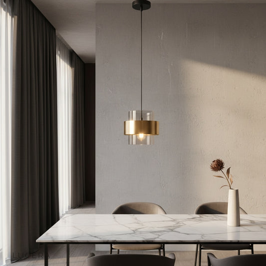 modern amber glass Ivor pendant light glowing above a dining table in a stylish living room