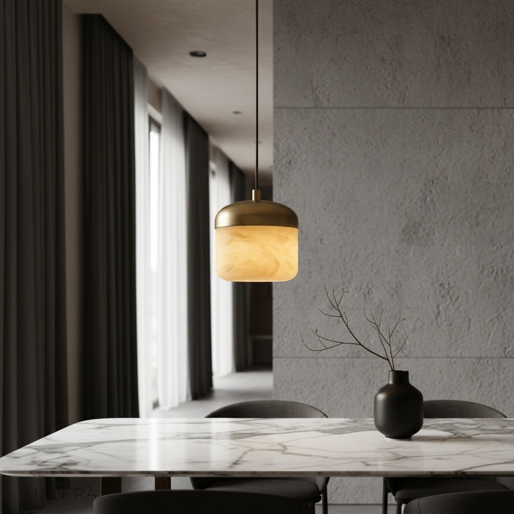Energico alabaster pendant light with copper accents in a modern dining room