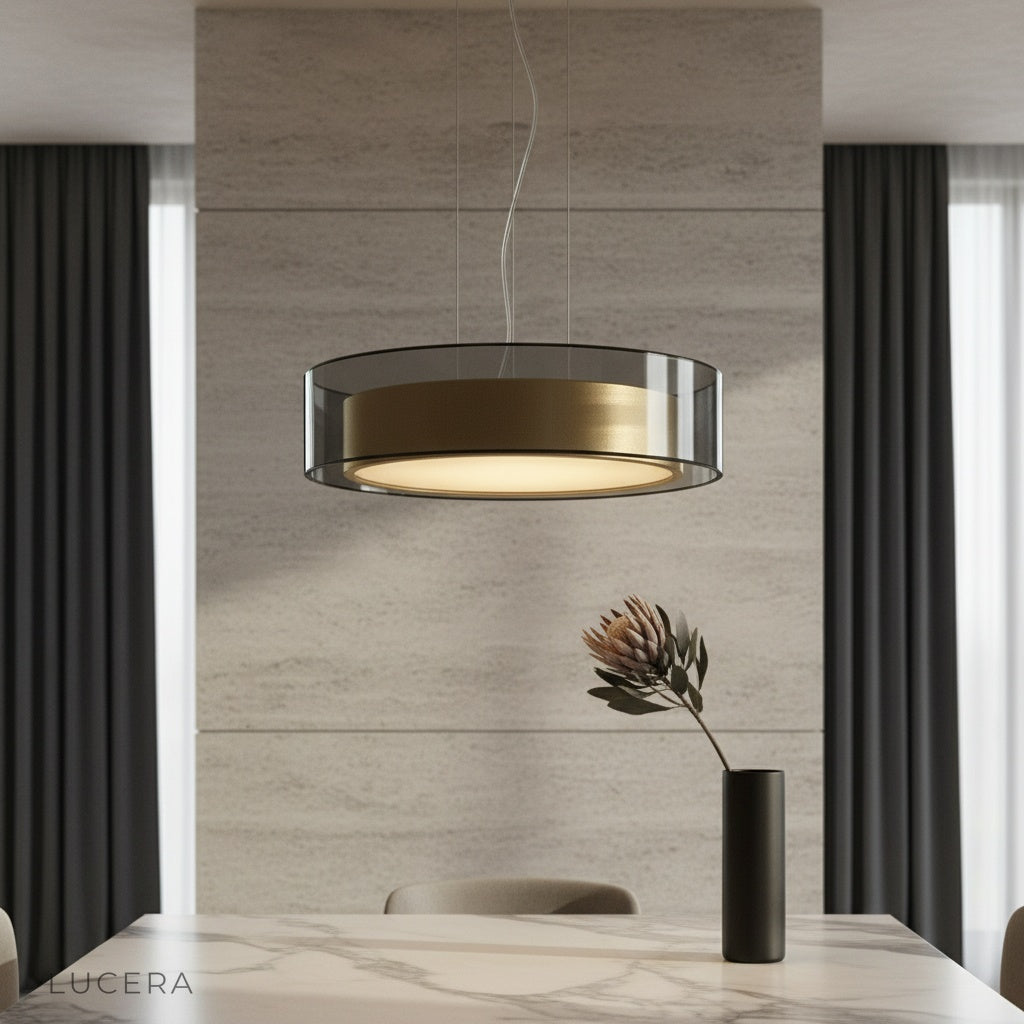 Kismet Pendant Light glowing over modern dining table in stylish living room
