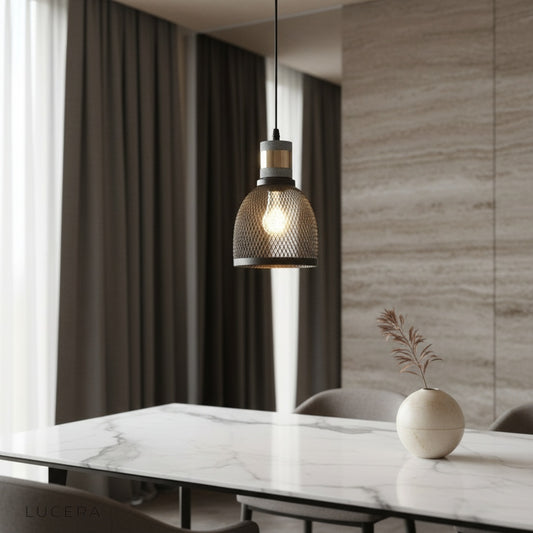modern Pontiff pendant light illuminating a stylish living room with sleek metal finish