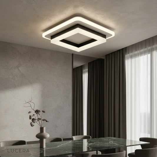 modern Isadora ceiling light glowing in a contemporary entryway with warm ambiance